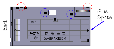 Camera back, showing latches and glue spots